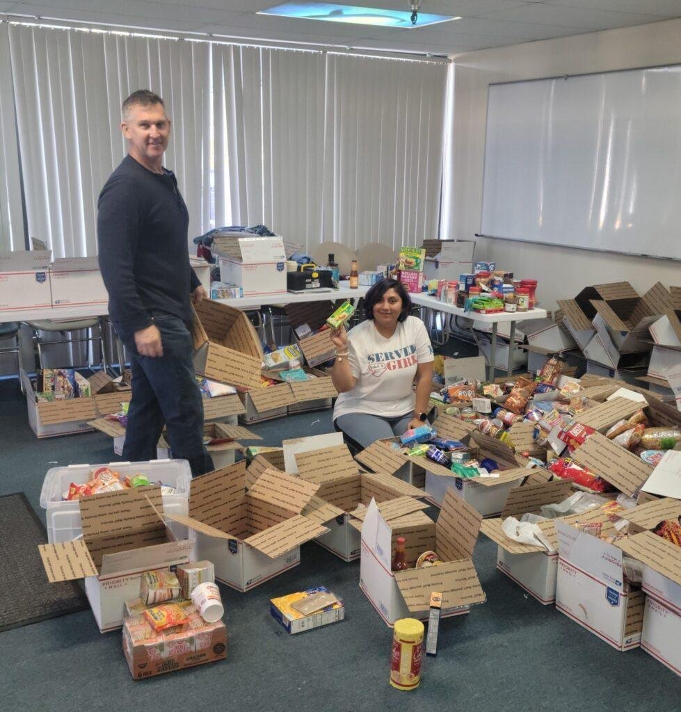 Merlyn and Russell VTS Board members -sorting Veteran Care Packages